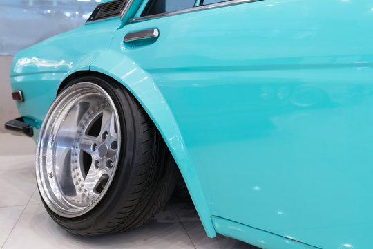Aggressive Wheel Offset in a retcar.
Hella Flush is Wheel offset, Small stretched tires, on a slammed vehicle = flush, or hella flush as people like to say.
Rims with a lot of offset.