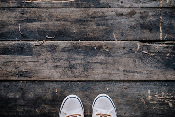 Personal perspective of the wood flooring, good for copy space and background. Selective focus.