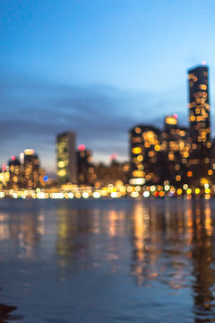Blurred night view on Manhattan from river 