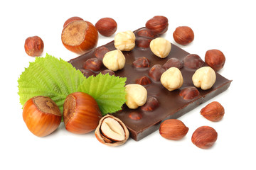 chocolate with hazelnuts and leaves isolated on white background