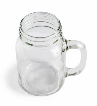 Blank glass jar, mason jar. Isolated on a white background.