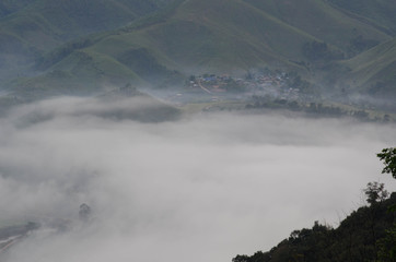 Village in the mist in the winter.