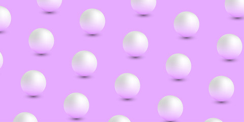 Pink background with white 3d balls pattern.