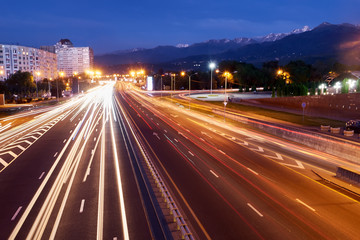 Obraz premium Almaty city night view. Lights trails at night on the road Avenue Al-Farabi