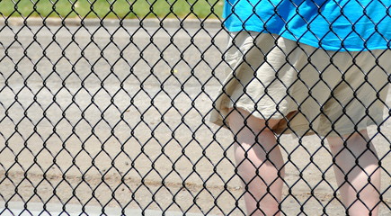 Overweight female walking outside to get some exercise.