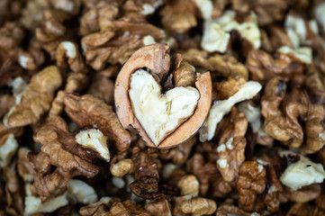 Walnuts kernels with color background, Whole walnut in a metal plate. Walnuts. Walnuts an market. Background of walnuts. Healthy. Fresh