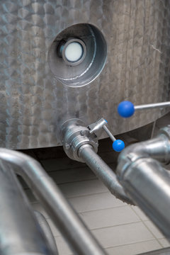 Metallic Stainless Steel Pipes  In Modern Dairy Plant Closeup