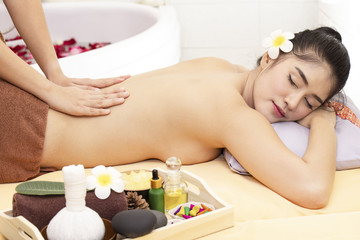 Fototapeta na wymiar Beautiful woman getting aromatherapy massage in spa for relaxation. Spa concept.