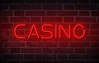 Fototapeta premium Red casino neon sign isolated on black