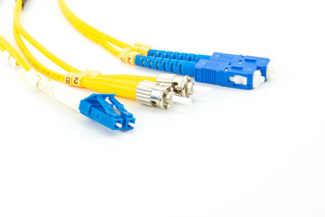 Single mode fiber optic cables patch cord with LC, SC and ST connector type on white background