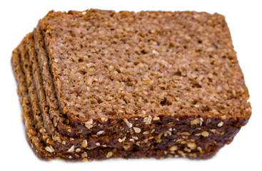 Slices of whole wheat multigrain toast isolated on white background