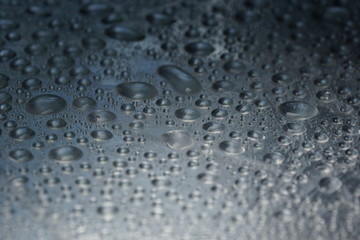 water drops on metal surface texture background
