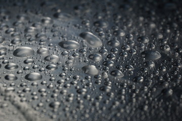 water drops on metal surface texture background