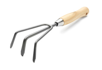 Metal rake for gardening on white background