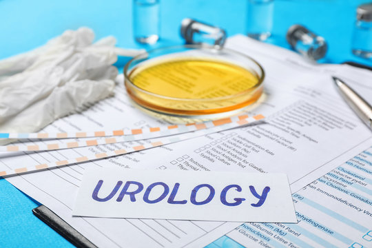 Composition with word "Urology" and test forms on color background