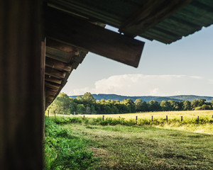 Fields and Trees Framed by the Eves of a Barn