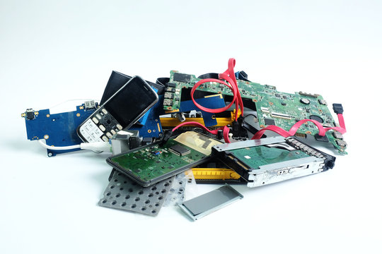 Pile of electronic waste isolated on white
