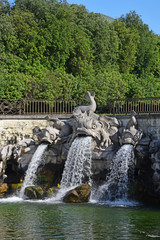 Fototapeta na wymiar Dolphins fountain in the Royal Palace Garden, Caserta, Italy.