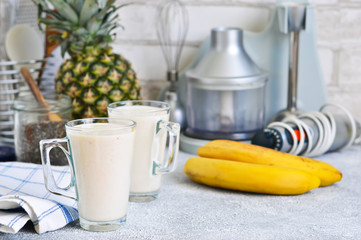Smoothies with yoghurt, pineapple and banana for breakfast. A natural diet drink. Detox menu.