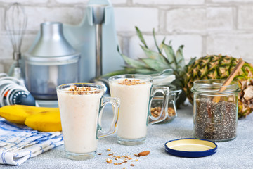 Smoothies with yoghurt, pineapple and banana for breakfast. A natural diet drink. Detox menu.