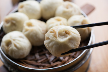 Steamed Xiaolongbao with chopsticks 