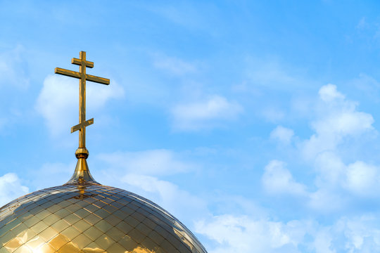 Orthodox cross on dome of church