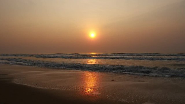 Sunrise at tropical beach. (Slow motion)