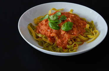Spaghetti With Tuna, Basil on black table