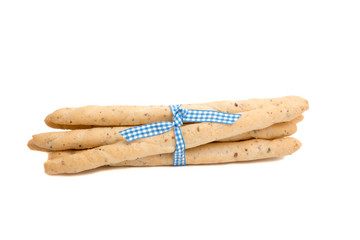 Bread sticks italian snack with blue ribbon isolated on the white