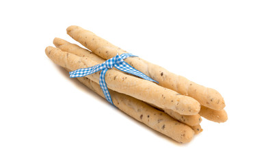 Bread sticks italian snack with blue ribbon isolated on the white
