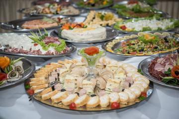 Delicious dishes on table in restaurant