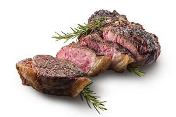 Sliced T-bone steak with rosemary