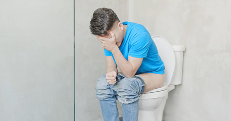 man feel pain with constipation