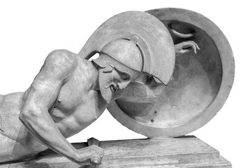 Warrior in helmet statue isolated on white background © Ruslan Gilmanshin