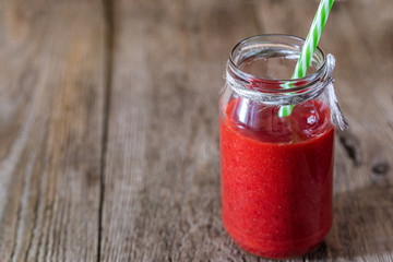 Smoothies of strawberry in a jar