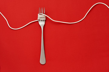 Fork wrapped with cable