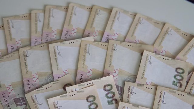  Cash of Ukrainian money - 500 grivna bills close-up, IMF currency tranche for Ukraine 2018-2019.