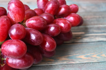 red grape on the wood background