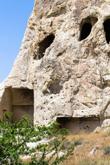 carved wall of ancient cave church near Goreme