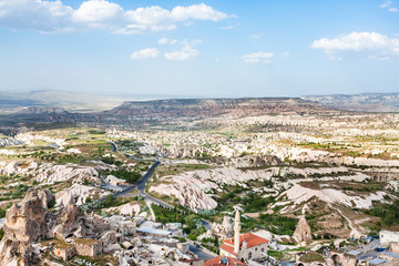 above view of Uchisar town and roads in valley