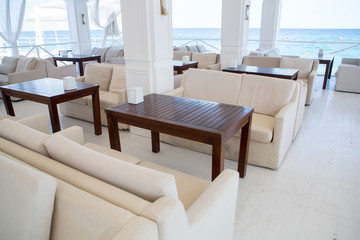 Interior of Elite comfortable beach resort with palm trees and pools. restaurant beach club highest level at resort for holiday in beach season.