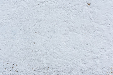 Wall fragment with scratches and cracks