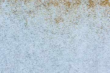 Wall fragment with scratches and cracks