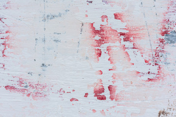 Wall fragment with scratches and cracks