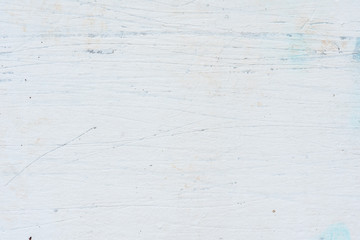 Wall fragment with scratches and cracks