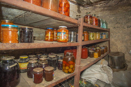 Vegetables And Fruit In The Basement With Food, For Storage For A Long Time.