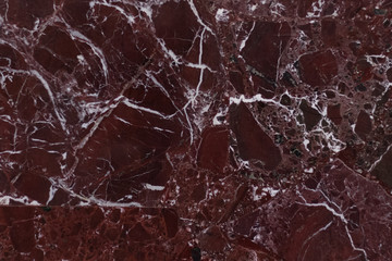 The red marble. Texture.