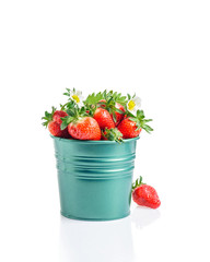 Fresh strawberries in bucket isolated on white background