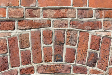 Red brick wall. Old ancient architecture background. Building wall structure details