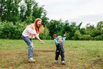 Portrait of a happy little boy playing in the park © matilda553